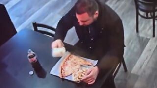 Customer Caught Pocketing Parmesan Shaker During Slice