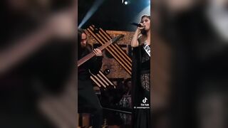 A candidate for Miss World Chile sings some death metal during the pageant semifinals