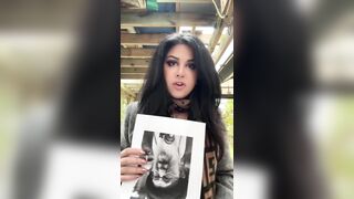 Iranian woman burns a picture of the demonic Ayatollah
