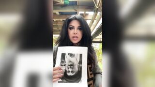 Iranian woman burns a picture of the demonic Ayatollah
