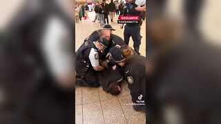 The guy has a knife, and the female police officer doesn't pull out her weapon.