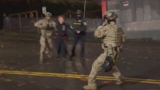 ICE officers ran out of the gate to make arrest of the female ANTIFA rioter