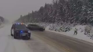 Close Call: Ontario officer jumping into ditch to avoid sliding SUV