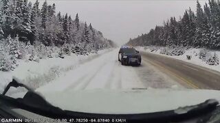 Close Call: Ontario officer jumping into ditch to avoid sliding SUV