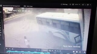 Out-of-control bus misses parked cyclist by just inches as it crashes into building