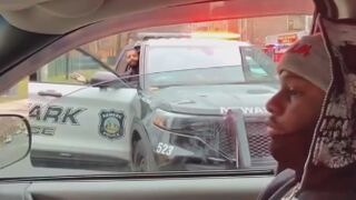 Man pulls up on a cop blocking traffic and challenges him to a game of connect 4