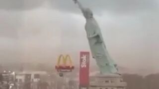 Symbolic? Strong winds knock over a replica of the Statue of Liberty in Guaíba, Brazil